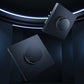 Two black AQARA Smart Rotary Knob H1 on a black background