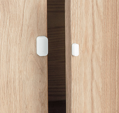 Ultra-compact magnetic reed switch for discreet placement