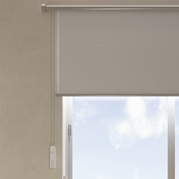 Modern interior with a smart door lock on a glass door, chair, and table visible.