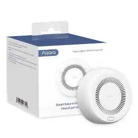 Smart Gas Detector beside its packaging on a white background