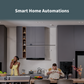 Modern kitchen with a Smart Smoke Detector mounted on the wall behind a couple