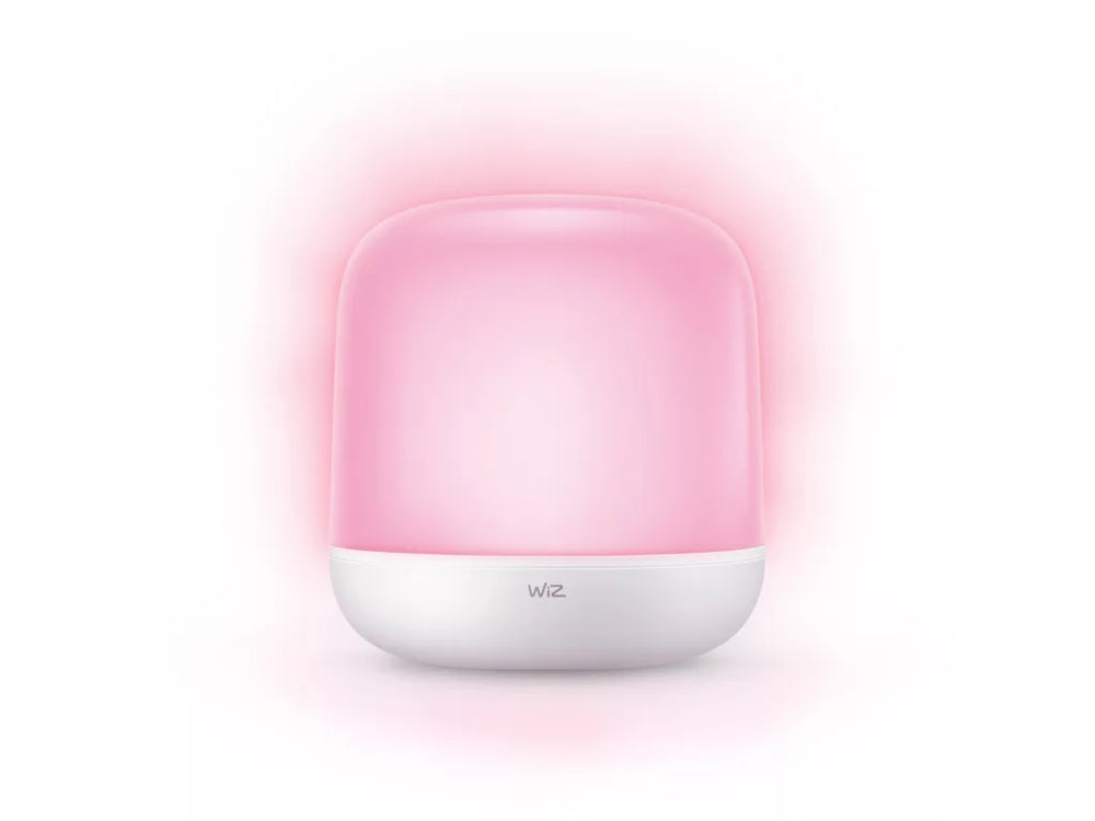 A small dome-shaped light with a glowing pink upper section and a white lower base, centered on a white background. The brand name 'wiz' is printed on the front of the white base.