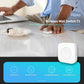 Aqara Wireless Mini Switch T1 being used on a desk with a person using a laptop.
