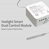 Yeelight smart dual control module shown in a clean studio-style render on a light gray background, with two white rectangular control boxes connected by thin cables and printed product text on the left.